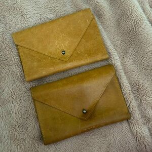 Two identical wallets from hearth and hand